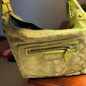 Green fabric Coach handbag